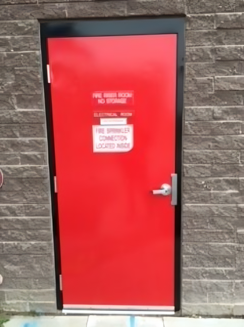 Albuquerque Public Schools painting project — red fire riser room service door